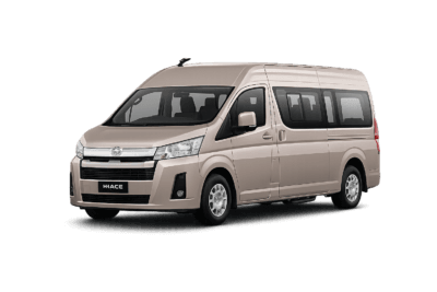 Toyota Hiace Premio coklat muda metallic tampak serong depan dan samping untuk layanan sewa Hiace Jakarta dengan driver profesional